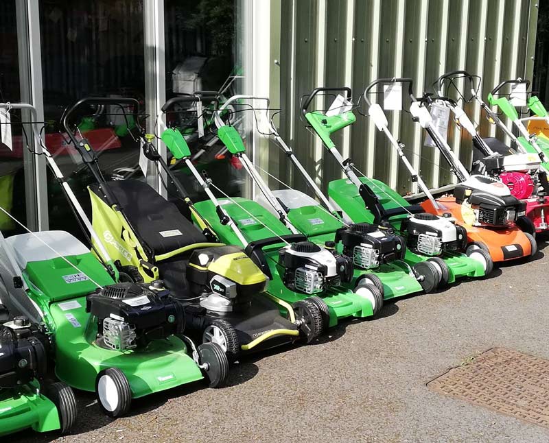 A selection of lawn mowers outside Clifton's Turf Machinery Shop
